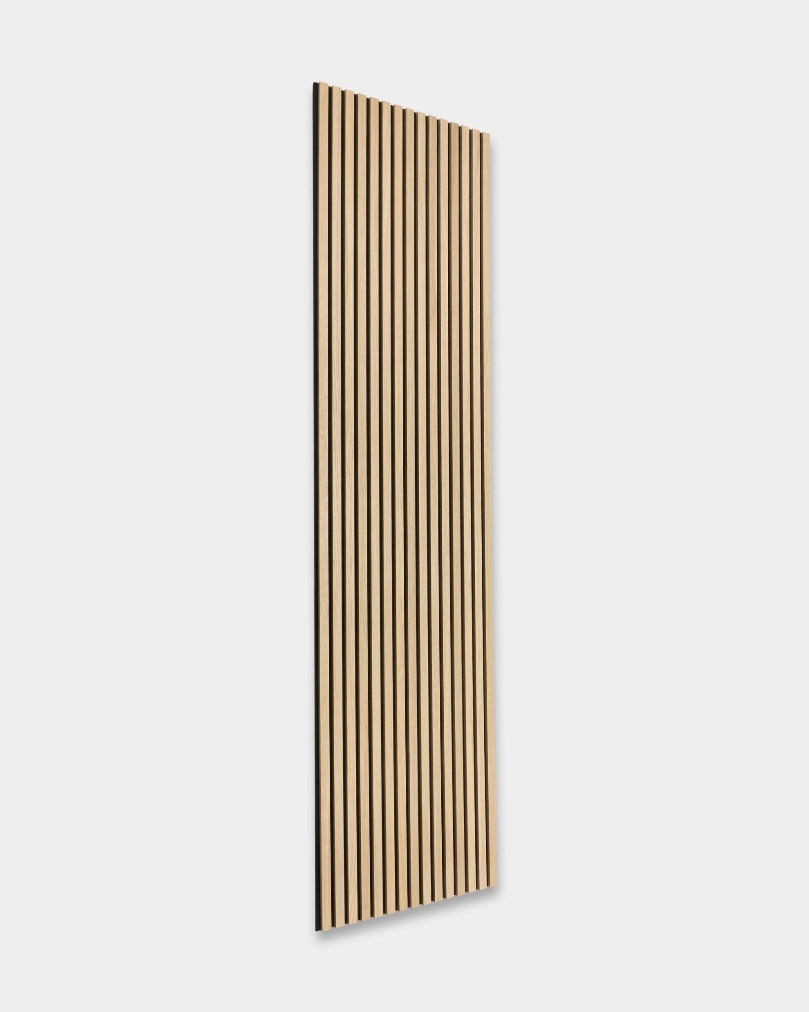 WoodUpp Original Akupanel acoustic panel in Classic Oak with black felt backing, 300x60 cm, featuring evenly spaced vertical slats in a Nordic design.