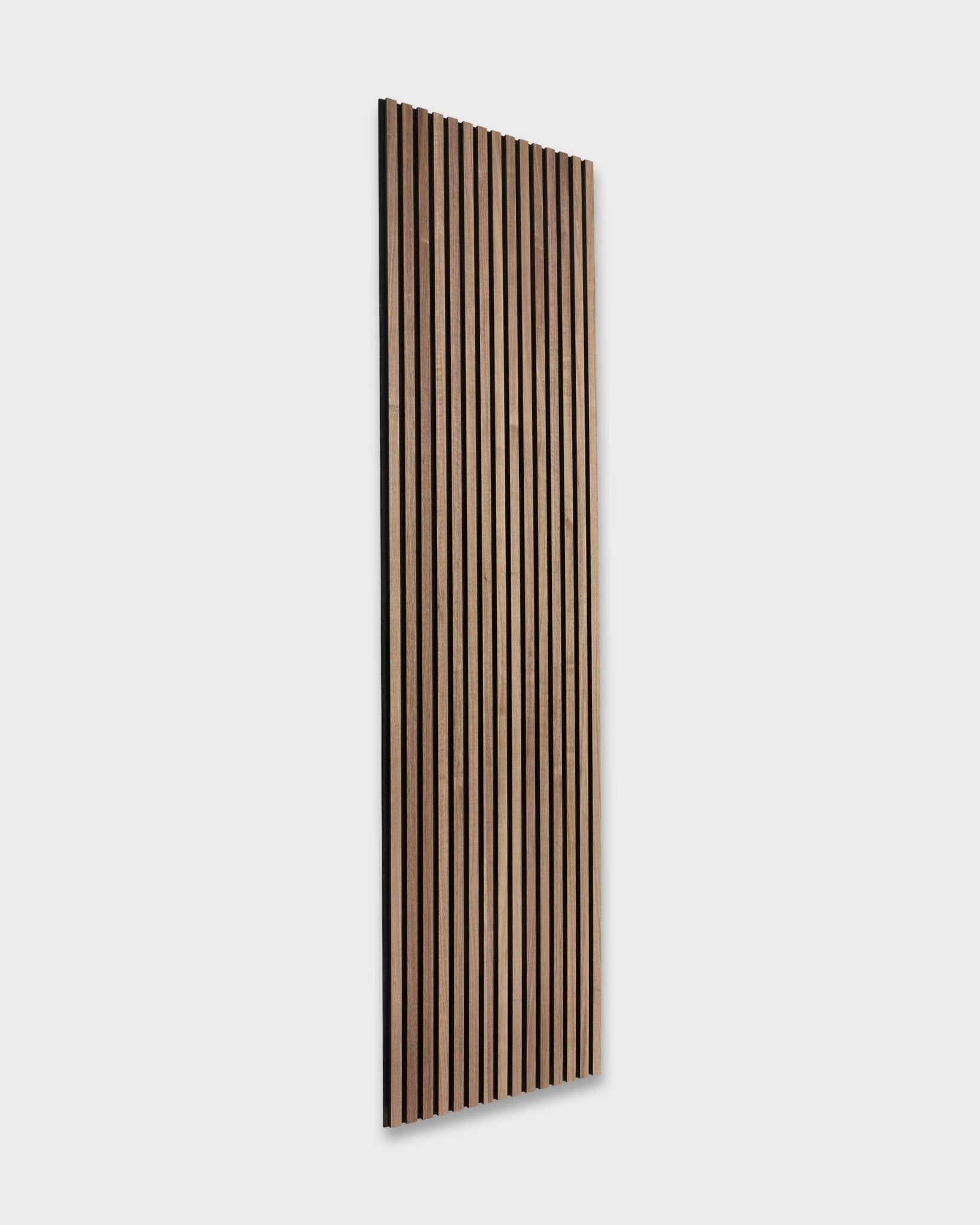 WoodUpp Original Akupanel in Walnut (240x60cm) features dark brown acoustic slats mounted on a light grey wall, showcasing Scandinavian-inspired Nordic design.