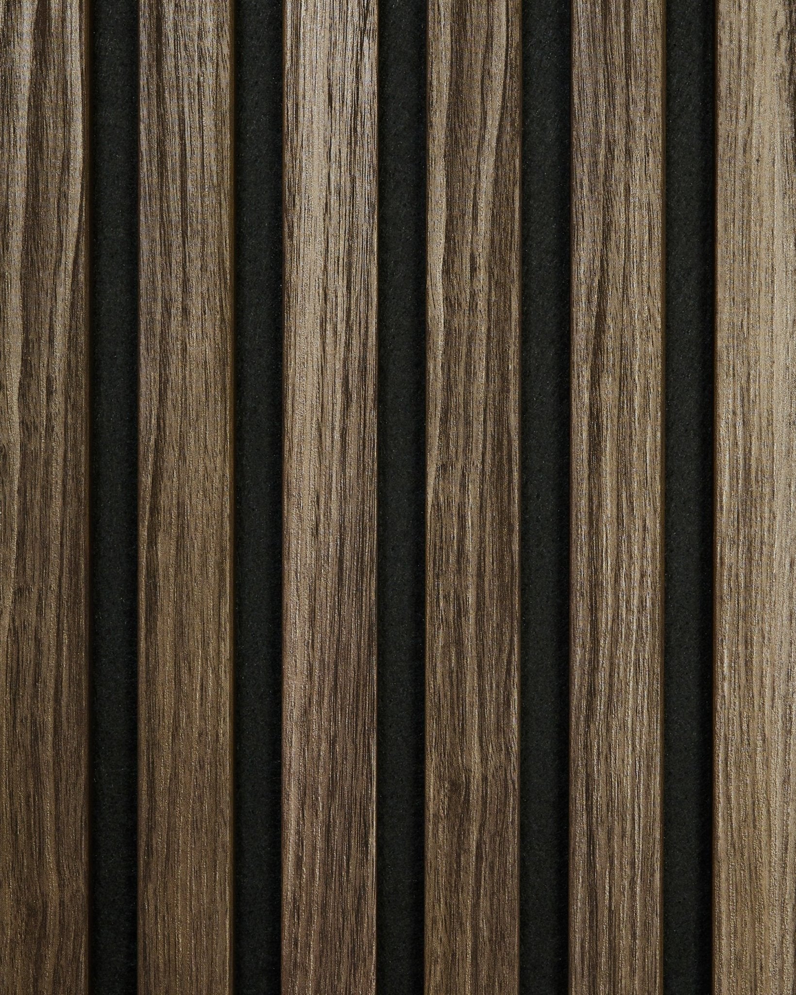 Akupanel sample in Black Oak from WoodUpp features vertical wooden slats against a dark background, highlighting the wood grain in a Nordic minimalist style.