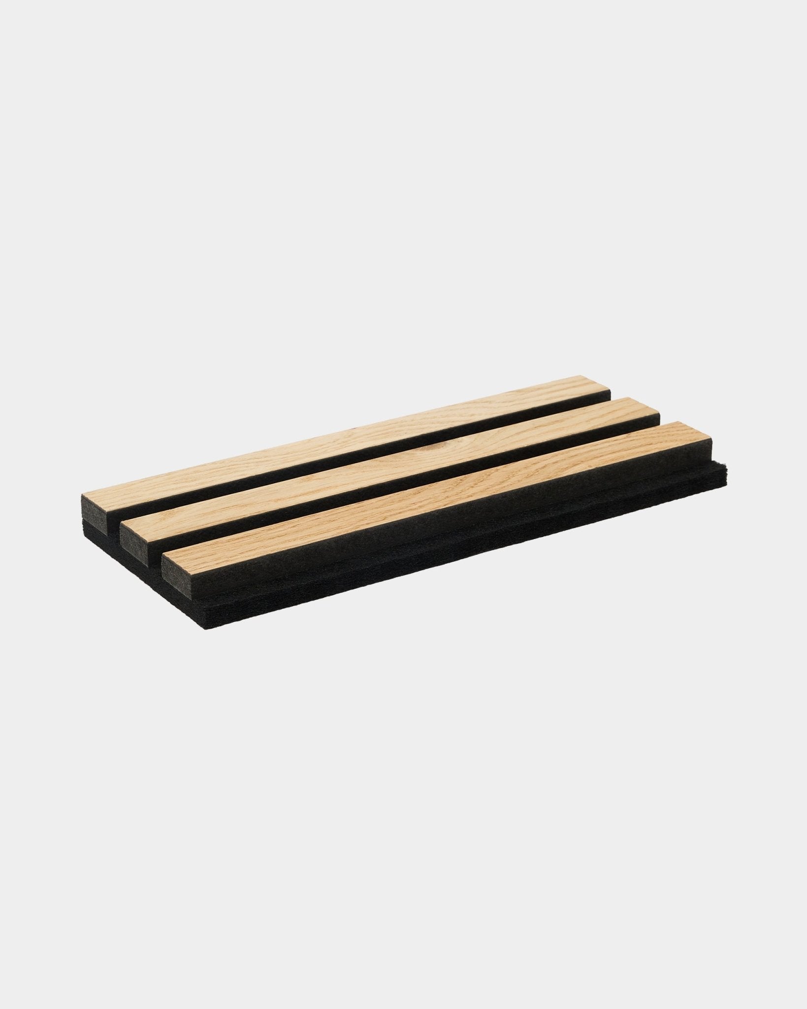 WoodUpp Rustic sample tray in Natural Oak, displaying three light oak acoustic slats and two black strips on a white background.