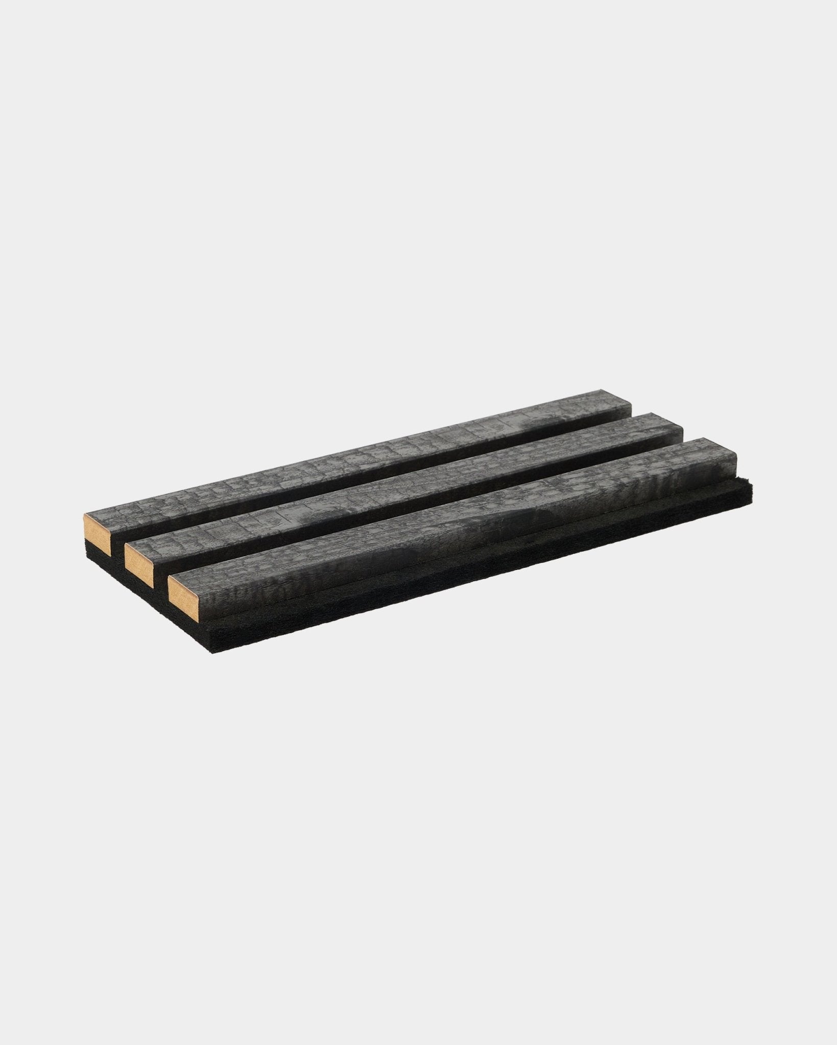 The Rebel charcoal trivet sample by WoodUpp, made of four black wooden slats, demonstrates durability and minimalist Nordic design for acoustic panel accessories.