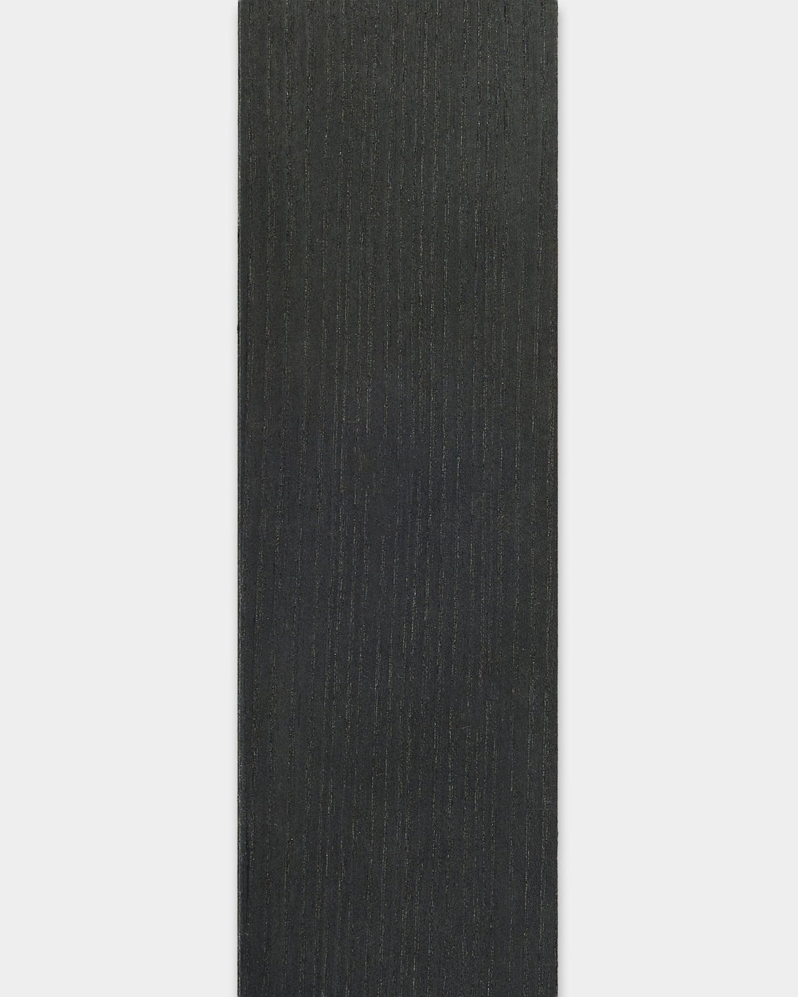 Rectangular black ash Lamella yoga mat by WoodUpp, 240 cm long, featuring subtle textured lines and edges inspired by Akupanel acoustic wood panels.