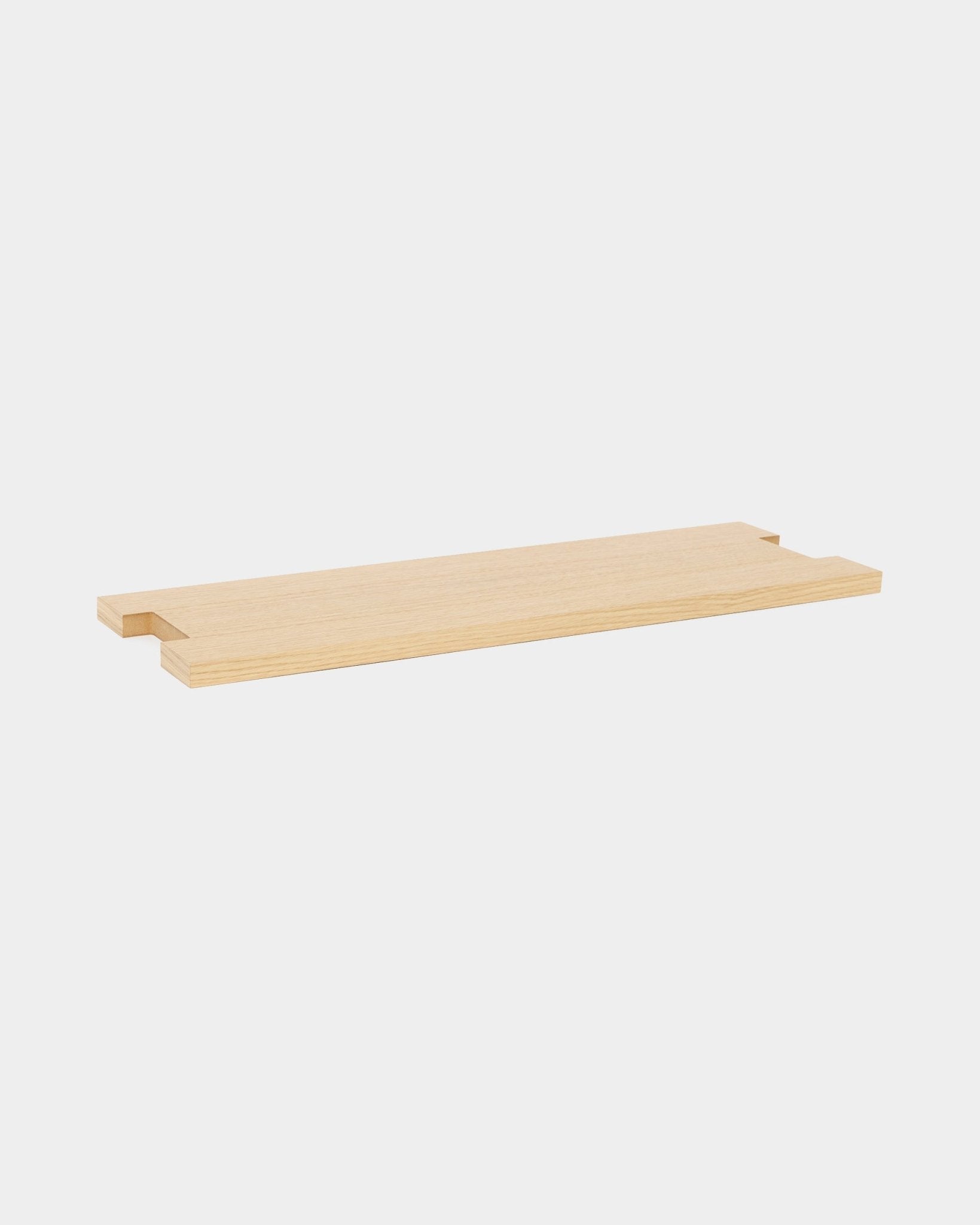 The Lova | Wood Shelf / BM2 by WoodUpp, oak veneer (65.8x20cm), with notched corners, minimalist Nordic design, displayed on a white background.