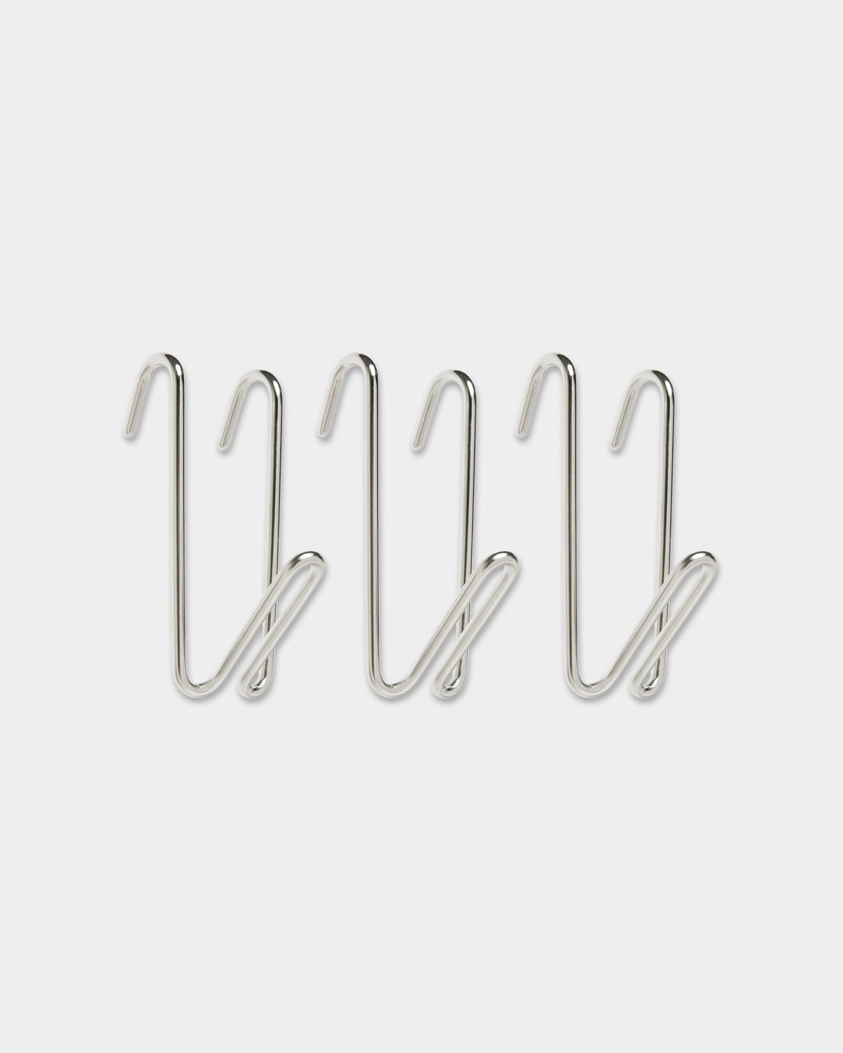 Three Alva Wire Hook / BM1, stainless steel, short size from WoodUpp’s CREATE collection, looped design, aligned in a row on a plain white background.