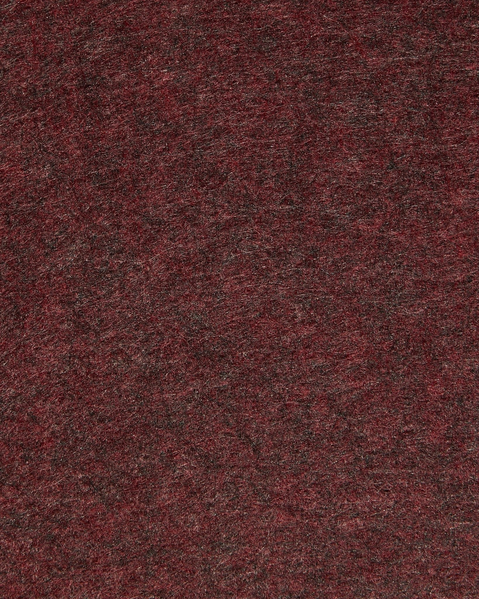 Nærbillede af WoodUpp Vigg | Felt Box / BM2 i ox red, der fremhæver tekstureret akustisk filt med diskrete nuancer og synlige fibre.