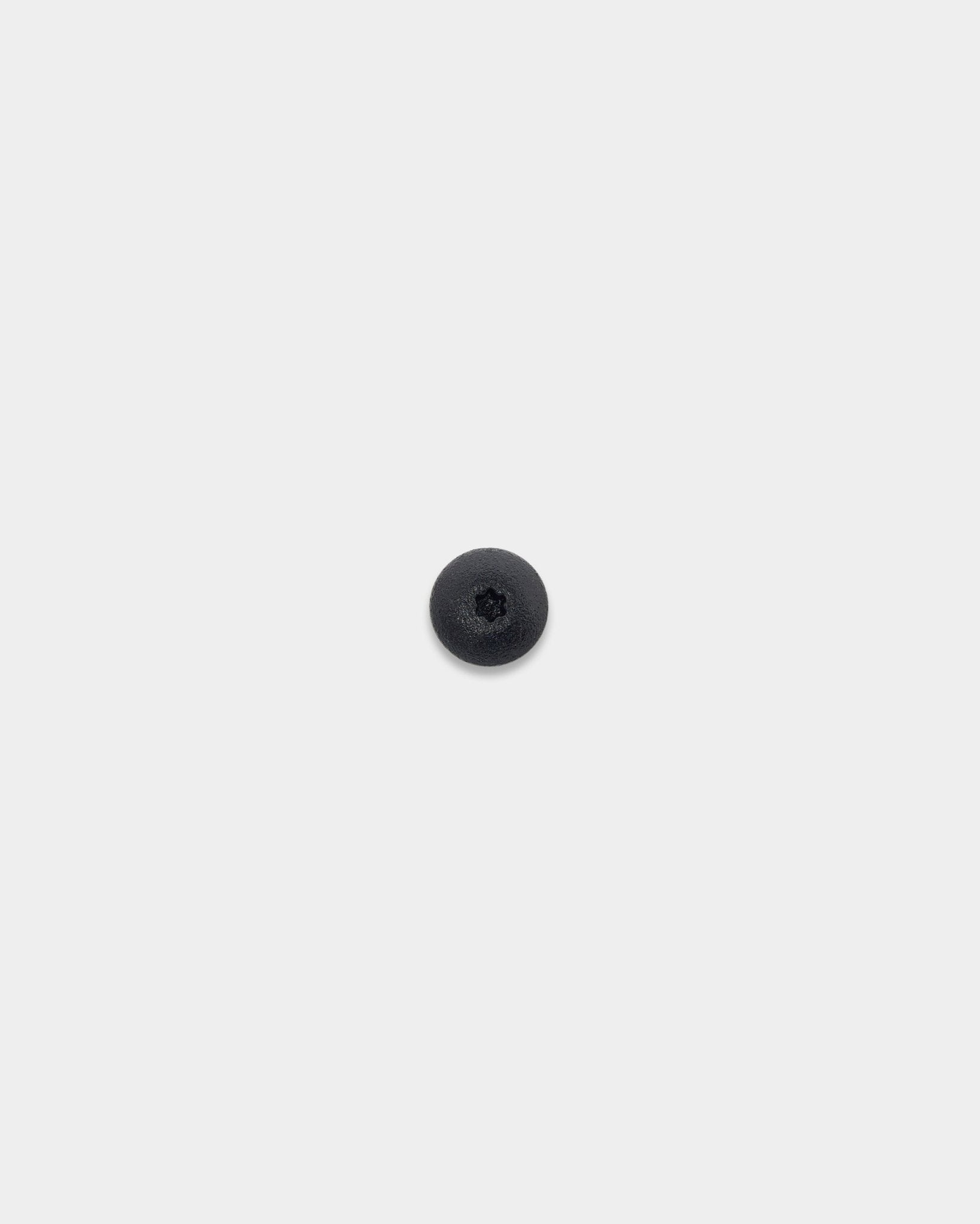 WoodUpp Front Screw til træ (4,8x35, black, Ø9,5-skive) centreret på en enkel hvid baggrund; tilbehør til Akupanel akustikpaneler.